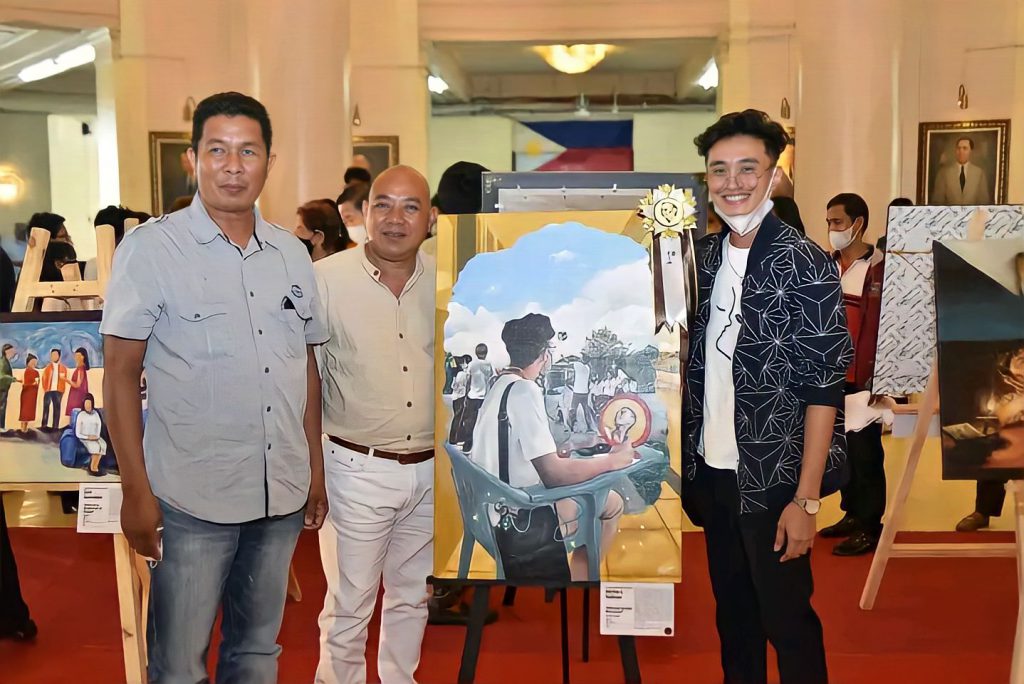 Alchie L. Salinas, a graduating student of the AB English Language Studies program, bagged the First Prize in the Bayanihan Art Awards 2023 of the Fernando C. Amorsolo Art Foundation Inc.